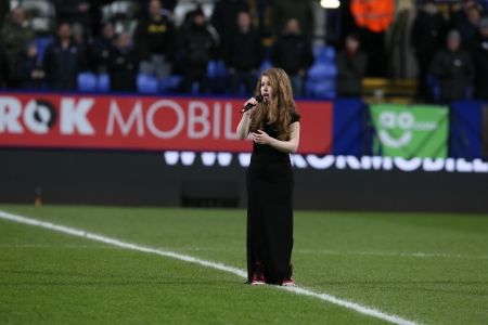 Remembering the 33: Joanna performs at the Macron Stadium, in memory of the Burnden Park Tragedy